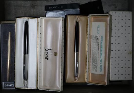 A collection of boxed post war Parker fountain and ball point pens